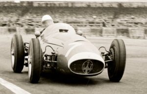 Stirling Moss with a Maserati 250 F at the 1954 British Grand Prix